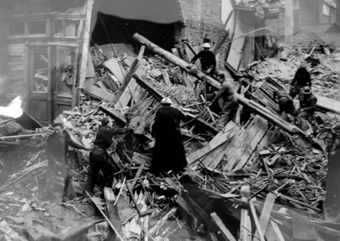 Photo:Rescue squad working in the wreckage of the Orleans Club, February 1944